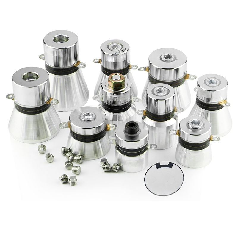 Industrial ultrasonic transducers for ultrasonic cleaning systems